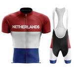 Los Países Bajos de los hombres en bicicleta o baberos